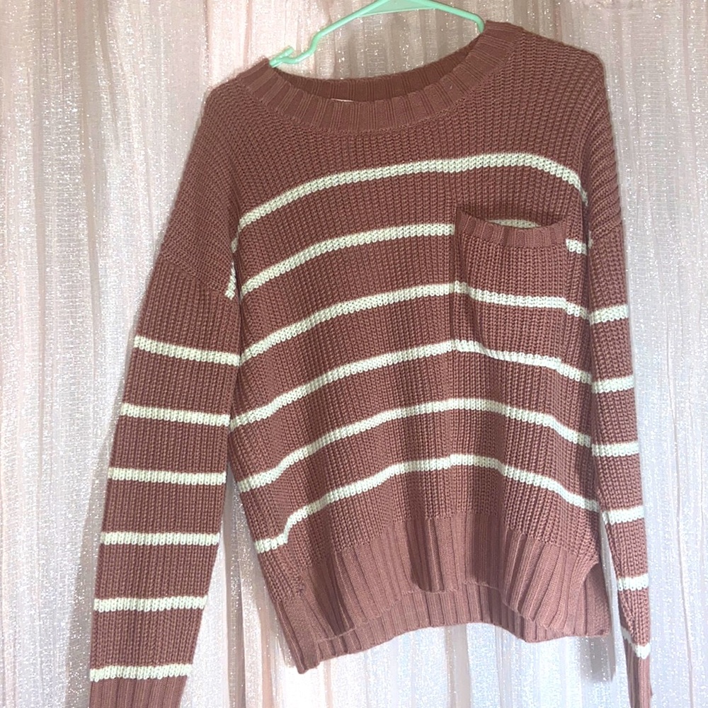 Selling a brand new Pink Rose sweater (tags still attached).